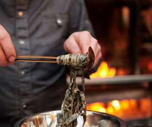 Chef swirling pasta