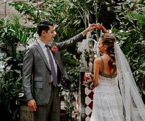 Groom twirling bride