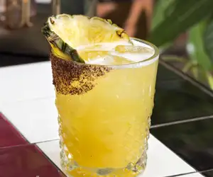 Pineapple garnished drink