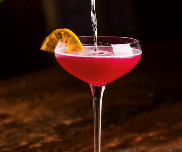 Red cocktail in coupe