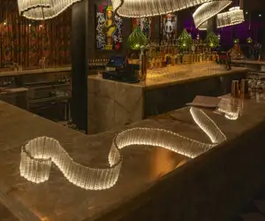 Light fixture reflecting on the bar at Kashmir. 